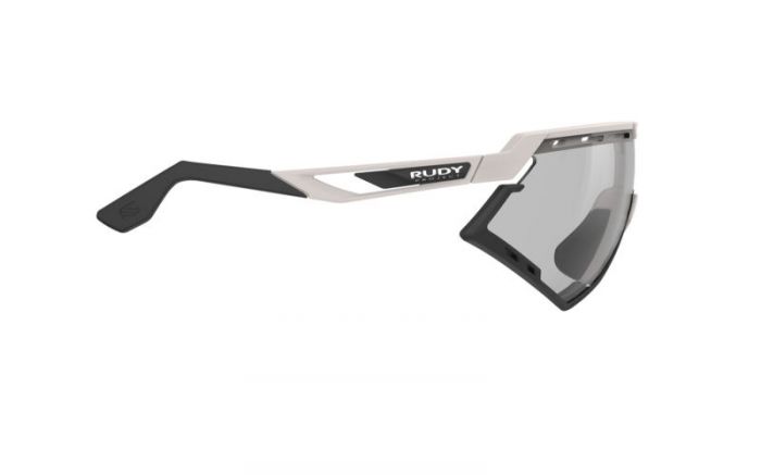 RUDY PROJECT DEFENDER SAND-BLACK BUMPERS/IMPACTX 2 PHOTOCHROMIC LASER BLACK napszem�veg